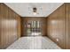 Cozy space featuring wood paneling and sliding glass doors at 4693 Sugar Hill Se Rd, Acworth, GA 30102
