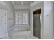 Spacious bathroom showcasing a large soaking tub, walk-in shower, and white shutters at 515 Butler National Dr, Johns Creek, GA 30097
