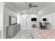 Large bedroom with grey carpet, light walls, and a desk by the window at 515 Butler National Dr, Johns Creek, GA 30097