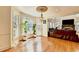 Dining area showcasing natural light with large windows and open access to the living room at 515 Butler National Dr, Johns Creek, GA 30097