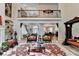 Spacious living room featuring high ceilings, second story balcony, and detailed trim at 515 Butler National Dr, Johns Creek, GA 30097