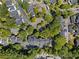A bird's-eye view showcases the well-maintained neighborhood with lush landscaping and convenient parking areas at 15 Paces West Nw Dr, Atlanta, GA 30327