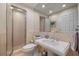 Bathroom features a spacious shower, large mirror, and pedestal sink at 15 Paces West Nw Dr, Atlanta, GA 30327