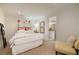 Cozy bedroom featuring accent wall, and decorative flower decor at 15 Paces West Nw Dr, Atlanta, GA 30327