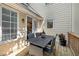 Outdoor patio area with seating, garden, and lantern, providing a relaxing outdoor space at 15 Paces West Nw Dr, Atlanta, GA 30327