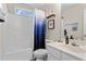 Neutral bathroom with a shower-tub combo and functional sink at 3130 Goldmist Dr, Buford, GA 30519