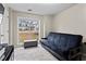 Cozy bedroom features a large window with a view of the neighborhood at 3130 Goldmist Dr, Buford, GA 30519