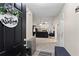 Inviting foyer leading to a spacious living area with vaulted ceilings and a cozy fireplace at 3130 Goldmist Dr, Buford, GA 30519