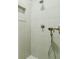 This shower features a dual shower head and a small built-in niche at 4022 Newhaven Cir, Brookhaven, GA 30319