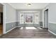 Bright dining room with a bay window and modern two-tone paint at 250 Felton Dr, Fayetteville, GA 30214