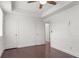 Bedroom featuring hardwood floors, white trim and walls, and a window with blinds at 261 Thompson St, Alpharetta, GA 30009