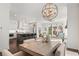 Open-concept: dining room, living room, and kitchen offer space and light at 261 Thompson St, Alpharetta, GA 30009