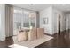 Charming dining room bathed in sunlight with modern accents at 261 Thompson St, Alpharetta, GA 30009
