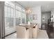 Bright dining space featuring large windows and cozy seating at 261 Thompson St, Alpharetta, GA 30009