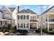 Charming two-story home featuring neutral siding, dark shutters, and inviting front porch at 261 Thompson St, Alpharetta, GA 30009