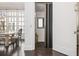 View of hardwood floors and nearby dining room with natural light from windows at 261 Thompson St, Alpharetta, GA 30009