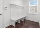 Mudroom featuring a bench, hooks, storage and hardwood floors at 261 Thompson St, Alpharetta, GA 30009