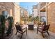 Outdoor patio area featuring comfortable seating and string lights at 261 Thompson St, Alpharetta, GA 30009