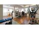 Spacious finished basement featuring wood flooring, workout space and recreational area at 4210 Gladney Dr, Atlanta, GA 30340