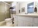 Functional bathroom with a shower, toilet, vanity and mirror at 4210 Gladney Dr, Atlanta, GA 30340