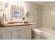 Full bathroom featuring tiled shower and white vanity at 4210 Gladney Dr, Atlanta, GA 30340