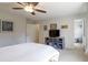 Bedroom with a ceiling fan and an entertainment center at 4210 Gladney Dr, Atlanta, GA 30340