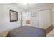 Neutral bedroom featuring carpet flooring, natural light and a closet for storage at 4210 Gladney Dr, Atlanta, GA 30340