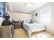 Bright bedroom with natural light, neutral walls and decor, and a comfortable double bed at 4210 Gladney Dr, Atlanta, GA 30340