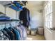 Well-organized walk-in closet with shelving and hanging space at 4210 Gladney Dr, Atlanta, GA 30340