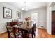 Bright dining room featuring hardwood floors, stylish decor, and natural light at 4210 Gladney Dr, Atlanta, GA 30340