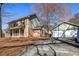 Charming two-story brick home featuring an inviting front porch and separate garage at 4210 Gladney Dr, Atlanta, GA 30340