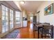 Open kitchen featuring hardwood floors, modern appliances, and access to an outdoor area at 4210 Gladney Dr, Atlanta, GA 30340