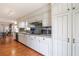 Well-appointed kitchen with tiled backsplash, sleek appliances, and abundant storage at 4210 Gladney Dr, Atlanta, GA 30340