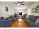 Open living room with hardwood floors and a comfortable seating area at 4210 Gladney Dr, Atlanta, GA 30340