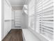 Organized walk-in closet with custom shelving and natural light from the window at 1200 Primrose Park Rd, Sugar Hill, GA 30518