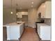 New kitchen with white cabinets, stainless steel appliances, and a marble island at 125 Laurel Farms Ln, Dallas, GA 30157