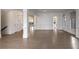 Spacious open-plan living room with detailed trim, hardwood floors, and elegant lighting at 2733 Caldwell Rd, Brookhaven, GA 30319