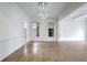 Open living room with hardwood floors, natural light, and elegant trim at 2733 Caldwell Rd, Brookhaven, GA 30319