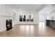Living room with hardwood floors, fireplace, and large window at 2733 Caldwell Rd, Brookhaven, GA 30319