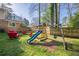 Backyard with fire pit and play set at 2736 Old Norcross Rd, Tucker, GA 30084
