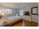 Bedroom with hardwood floors, a ceiling fan, and a chest of drawers at 2736 Old Norcross Rd, Tucker, GA 30084
