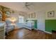 bedroom featuring hardwood floors, soft lighting and a playful design at 2736 Old Norcross Rd, Tucker, GA 30084