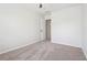Simple bedroom with neutral walls, plush carpeting, and natural light at 260 Westview Sw Pl, Atlanta, GA 30314