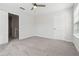 Bedroom with neutral carpet, ceiling fan, and natural light at 260 Westview Sw Pl, Atlanta, GA 30314