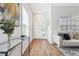 Welcoming entryway features wood floors and stylish decor leading to a living space at 260 Westview Sw Pl, Atlanta, GA 30314
