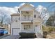 Charming two-story home featuring a double porch and light blue front door at 260 Westview Sw Pl, Atlanta, GA 30314