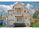 Charming two-story home with a covered porch, balcony, garage and well-maintained lawn at 260 Westview Sw Pl, Atlanta, GA 30314
