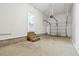 Spacious two car garage with wooden steps leading to interior at 260 Westview Sw Pl, Atlanta, GA 30314
