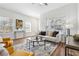 Bright and airy living room featuring hardwood floors, modern furniture, and ample natural light at 260 Westview Sw Pl, Atlanta, GA 30314