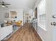Bright living room featuring modern decor and hardwood floors with an open floor plan at 260 Westview Sw Pl, Atlanta, GA 30314